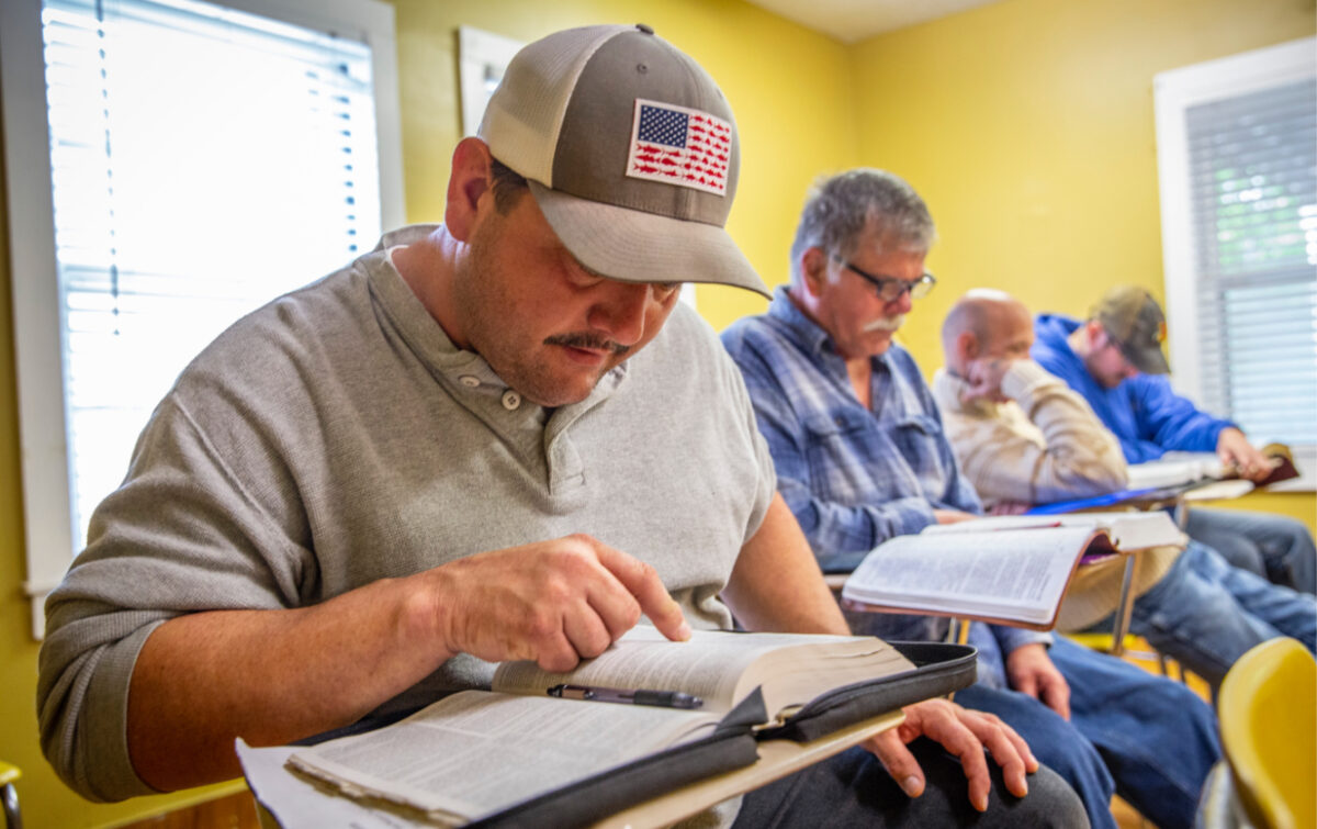 Warriors Center residents studying together in a Bootcamp class