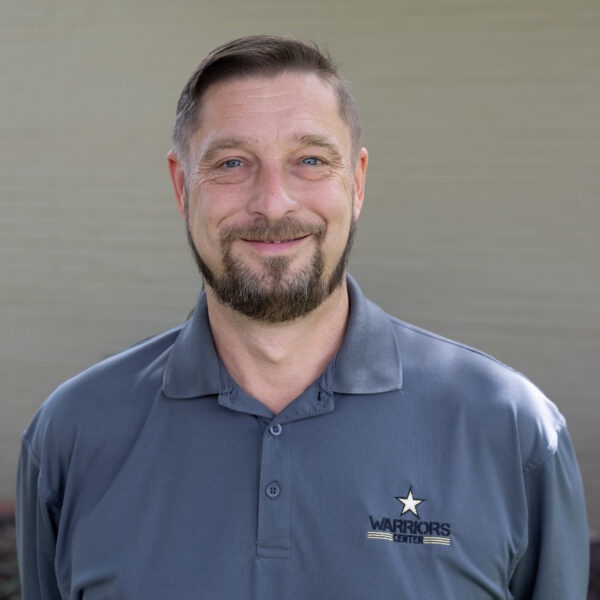 BRYAN POLLARD, Assistant Director
