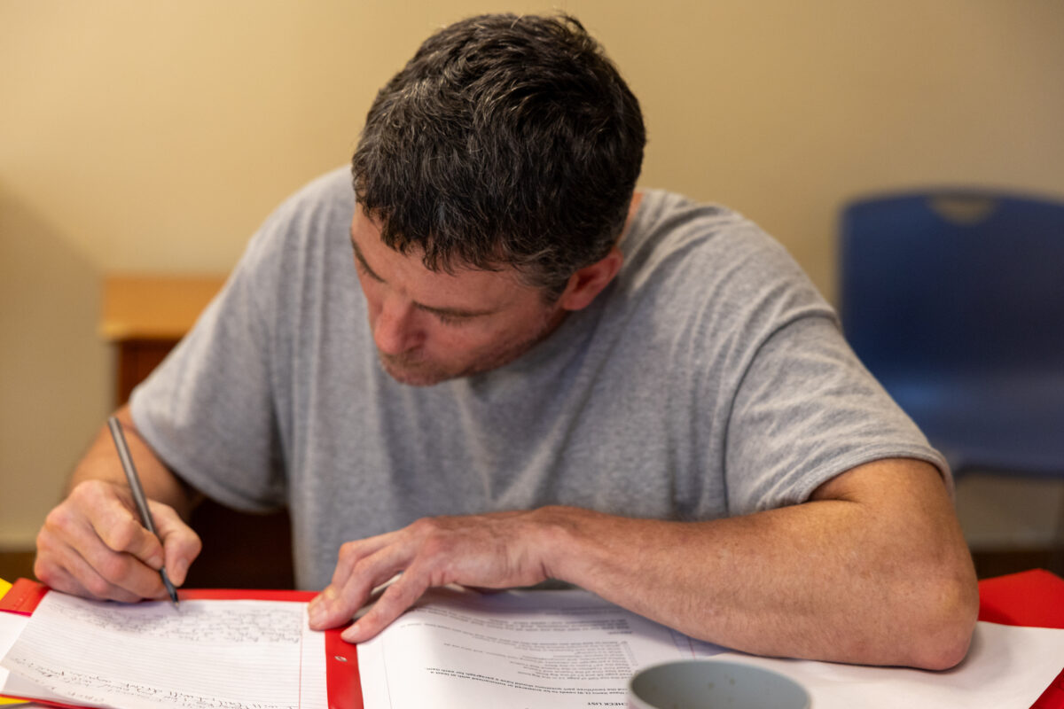 A Warriors Center resident working through recovery coursework