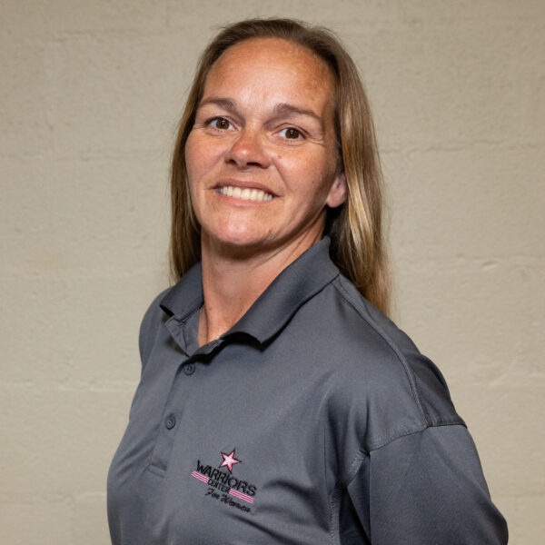 THERESA HUGHES, Assistant Director
