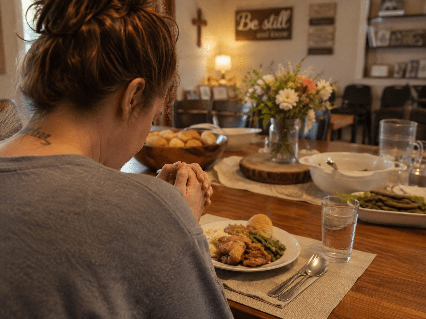 A woman sharing a meal at Warriors Center New Albany