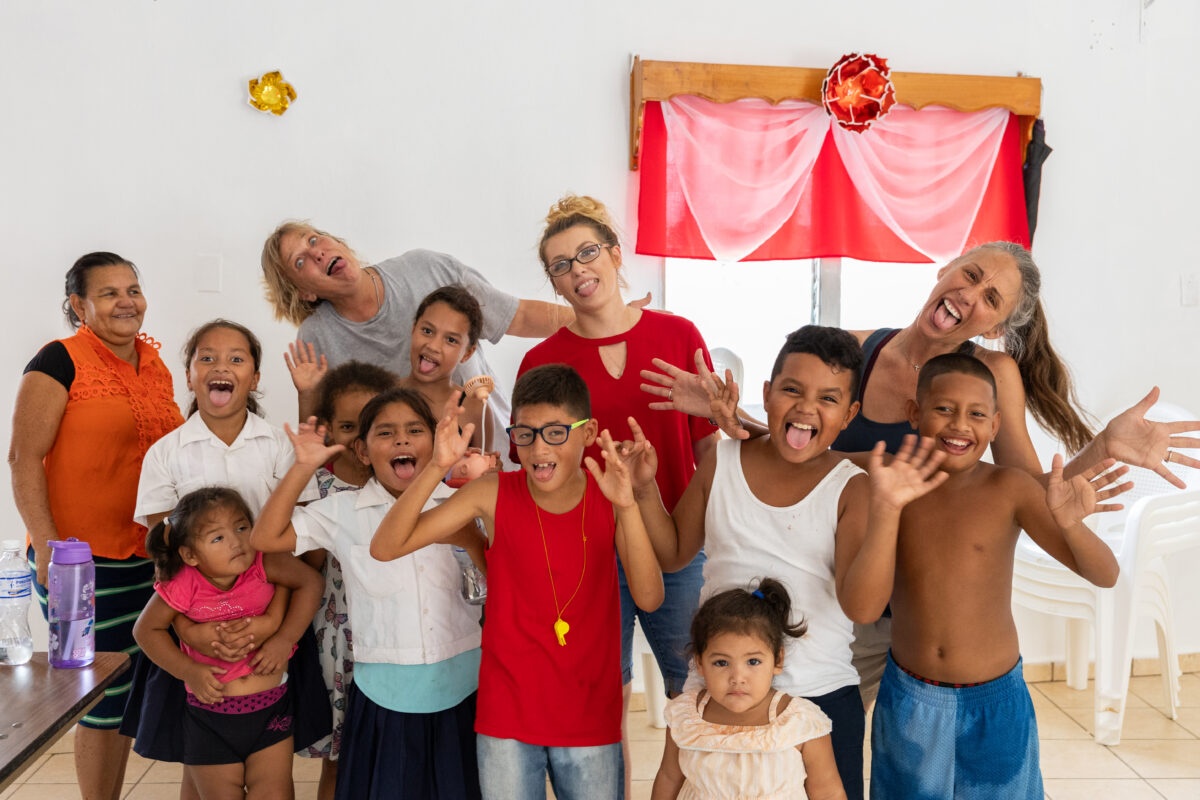 Children and mission team members celebrating together in Honduras